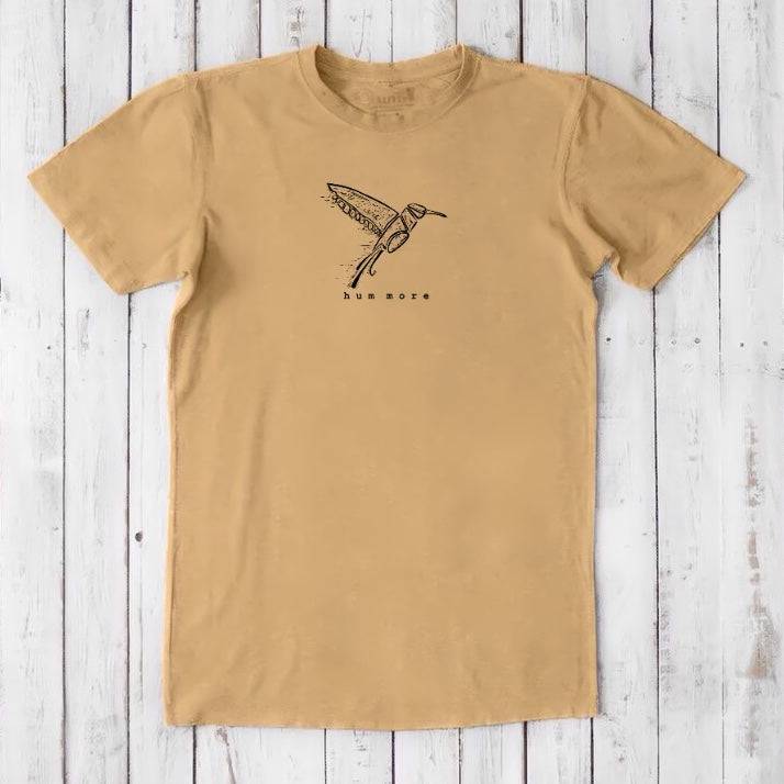 Men's Hummingbird T-Shirt in Bamboo & Organic Cotton, camel tan color with sketched hummingbird and 'hum more' quote, nature lover gift.
