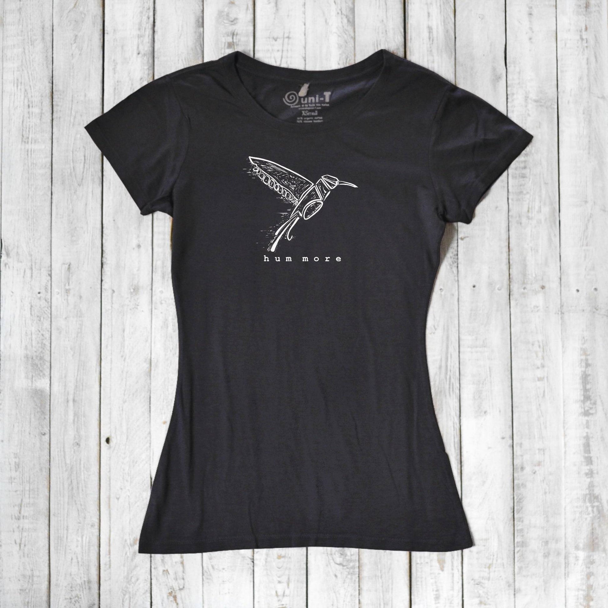 Black Hum More Women's Bamboo Hummingbird Shirt with white hummingbird line art, perfect for eco-conscious fashion lovers.