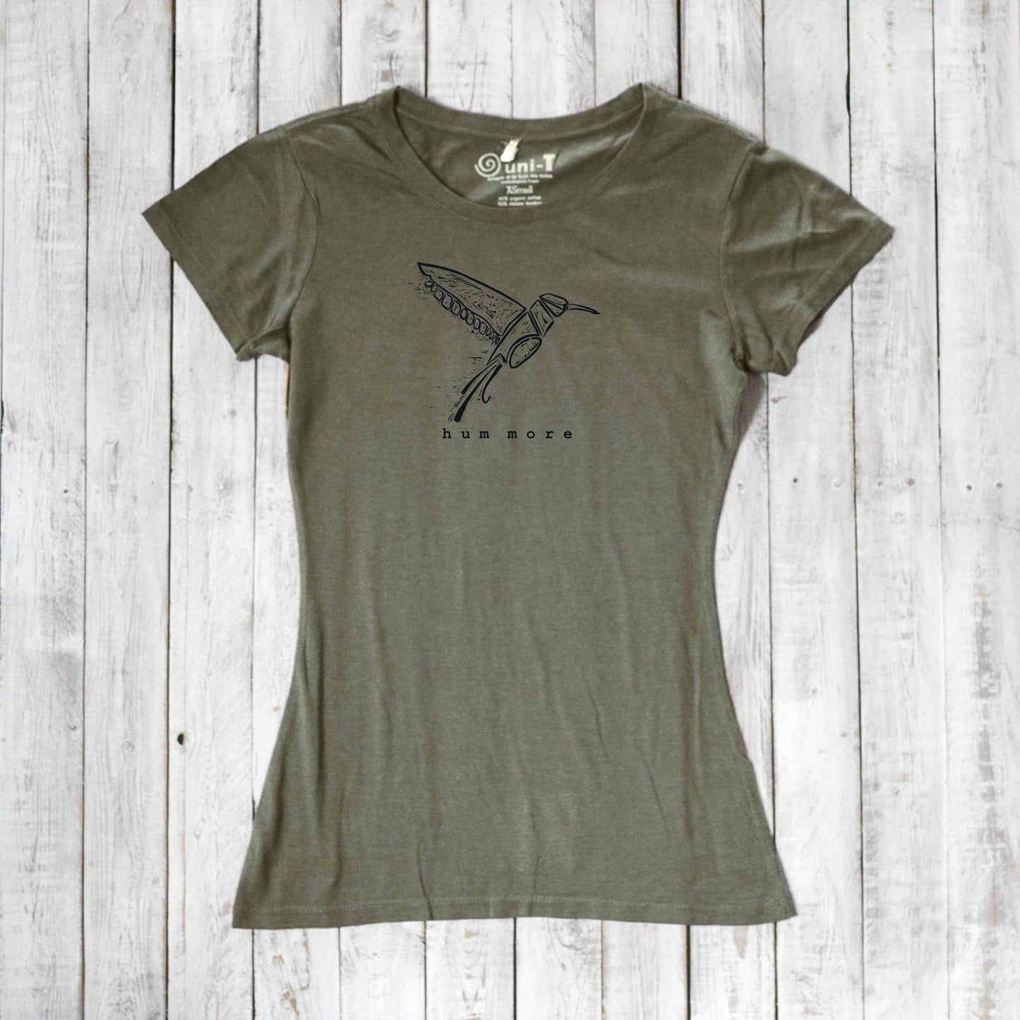 Olive green Hum More Women's Bamboo Hummingbird Shirt with artistic bird graphic, crafted from bamboo and organic cotton for sustainable style.