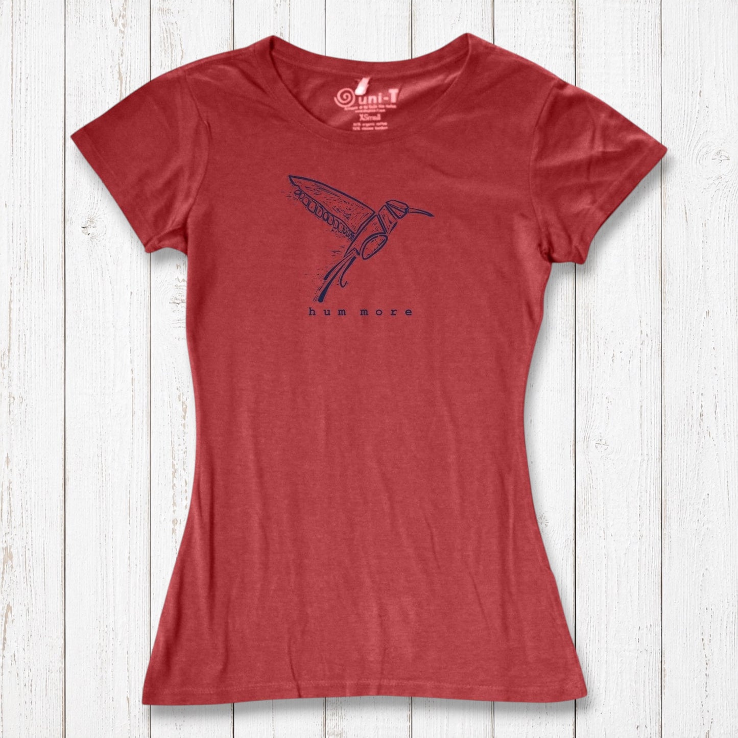 Bright red Hum More Women's Bamboo Hummingbird Shirt featuring a minimalist hummingbird graphic, made from eco-friendly fabric.