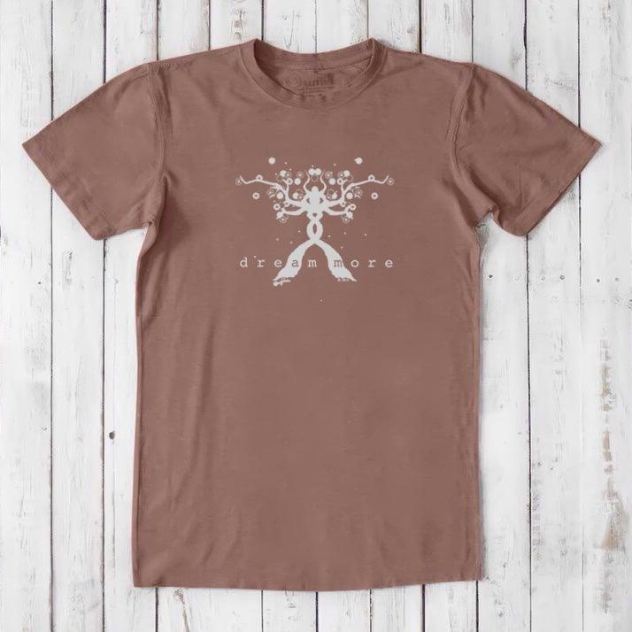 Rust brown men's t-shirt with white 'Dream More' tree design. Crafted from bamboo and organic cotton for sustainable everyday wear.