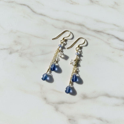 Gold chain drop earrings with blue and clear gemstones