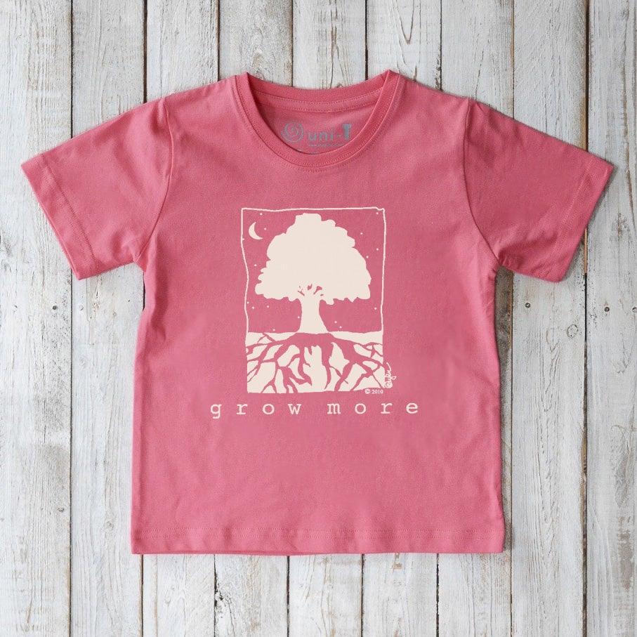 Pink Kids' Organic Cotton T-Shirt with white tree and 'Grow More' graphic, nature-inspired sustainable top by Uni-T.