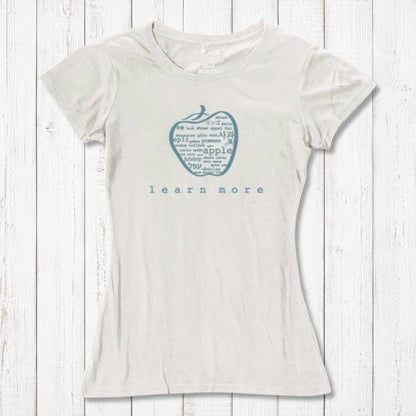 White women's apple graphic T-shirt in bamboo & organic cotton with 'learn more' text, sustainable and stylish teacher gift.