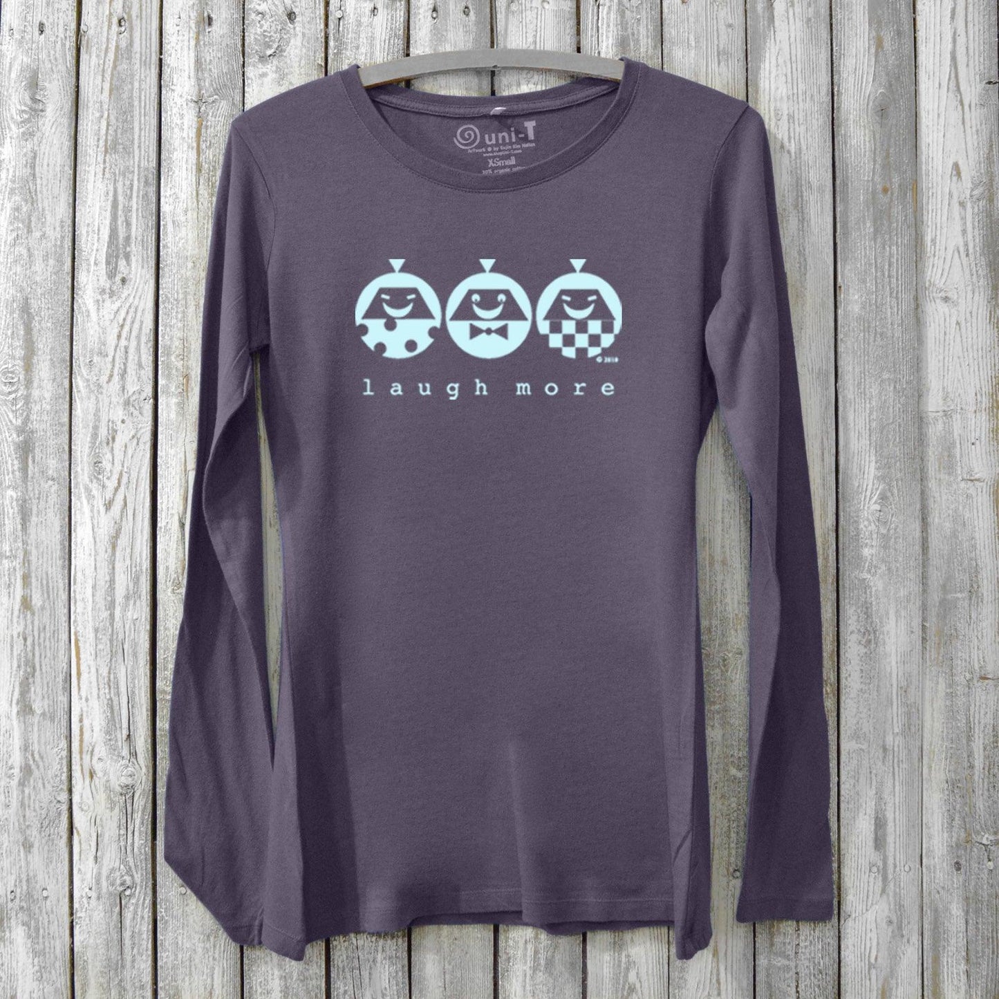 Women's Happy Long Sleeve T-Shirt in dark purple bamboo & organic cotton with 'Laugh More' graphic and cheerful character design by Uni-T.
