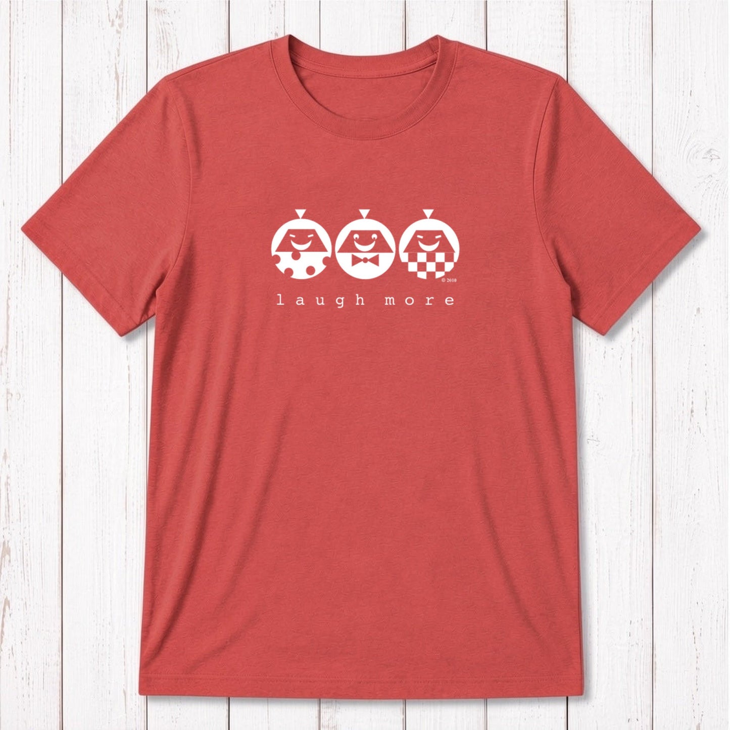 Men's Happy T-Shirt in Bamboo & Organic Cotton in coral red with mint 'Laugh More' cartoon design. Positive vibe gift for men.
