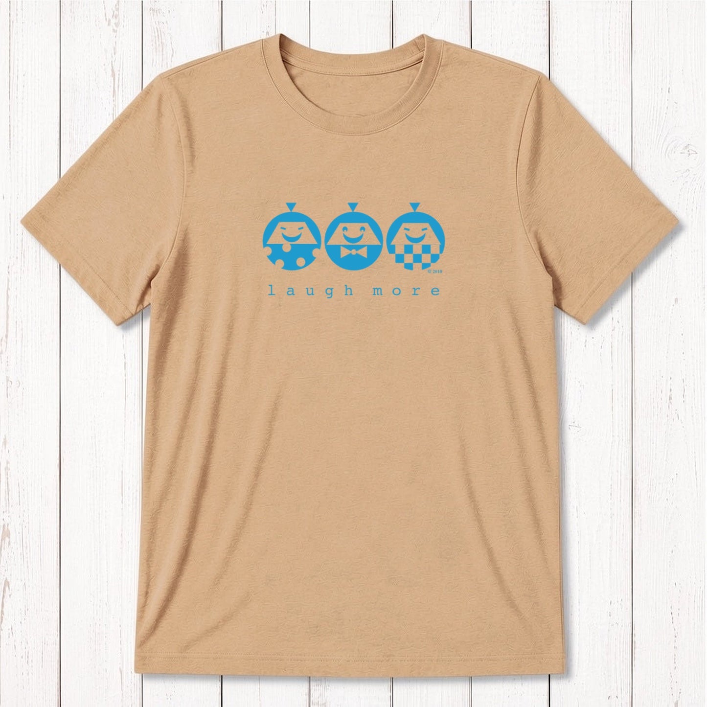 Men's Happy T-Shirt in Bamboo & Organic Cotton in tan with mint 'Laugh More' cartoon faces. Positive message gift for men.