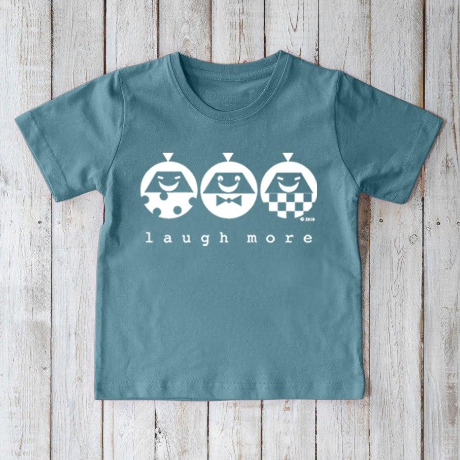 Teal blue Kids' Happy Vibe Organic Cotton T-Shirt with white 'Laugh More' design. Sustainable and fun graphic tee for children.