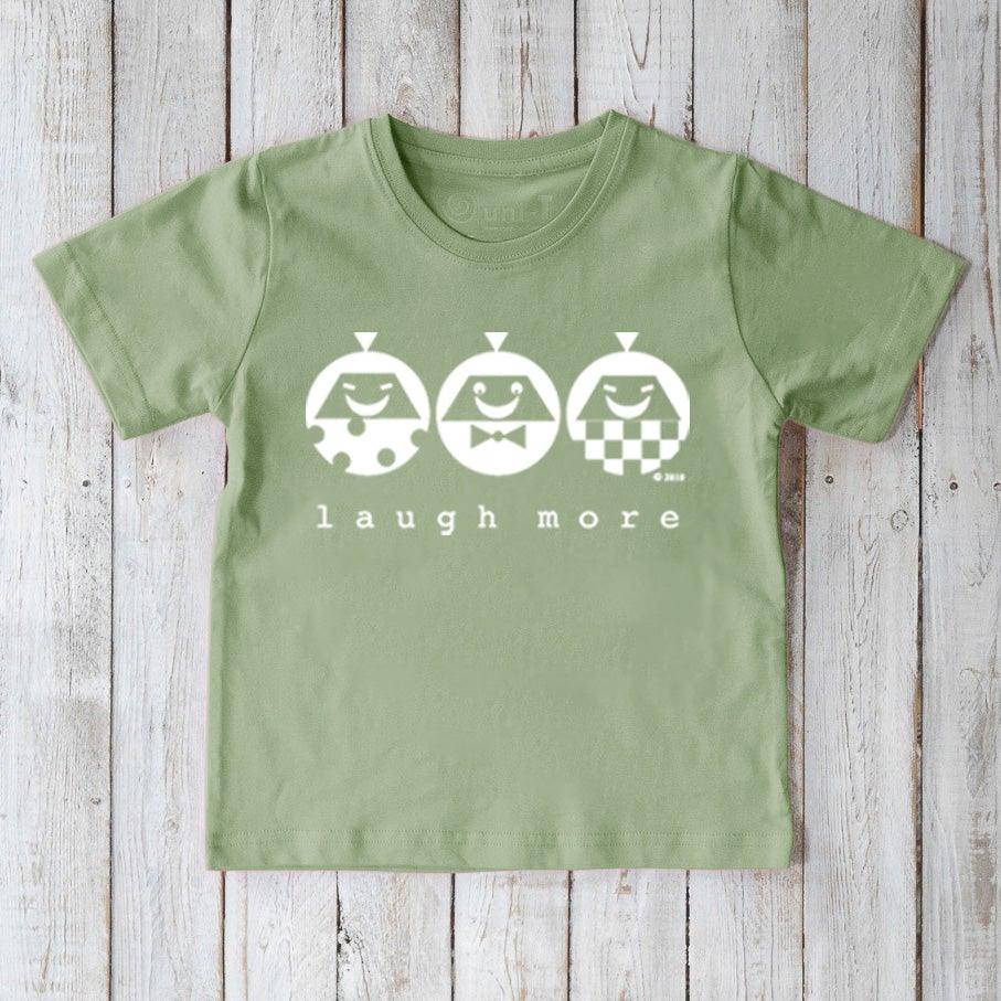 Light green Kids' Happy Vibe Organic Cotton T-Shirt with white 'Laugh More' print. Eco-friendly and cheerful top for kids by Uni-T.
