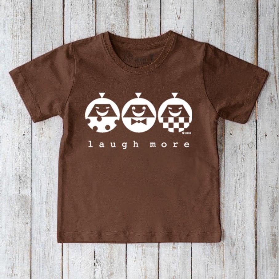 Brown Kids' Happy Vibe Organic Cotton T-Shirt with white 'Laugh More' characters. Sustainable and fun graphic tee for children.