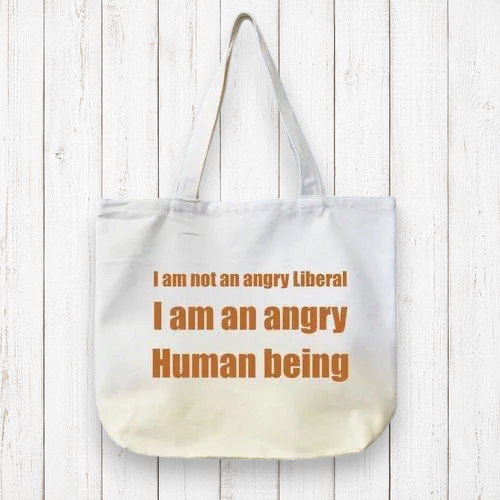 Liberal organic canvas tote bag with brown text reading 'I am not an angry Liberal, I am an angry Human being' on eco-friendly fabric.