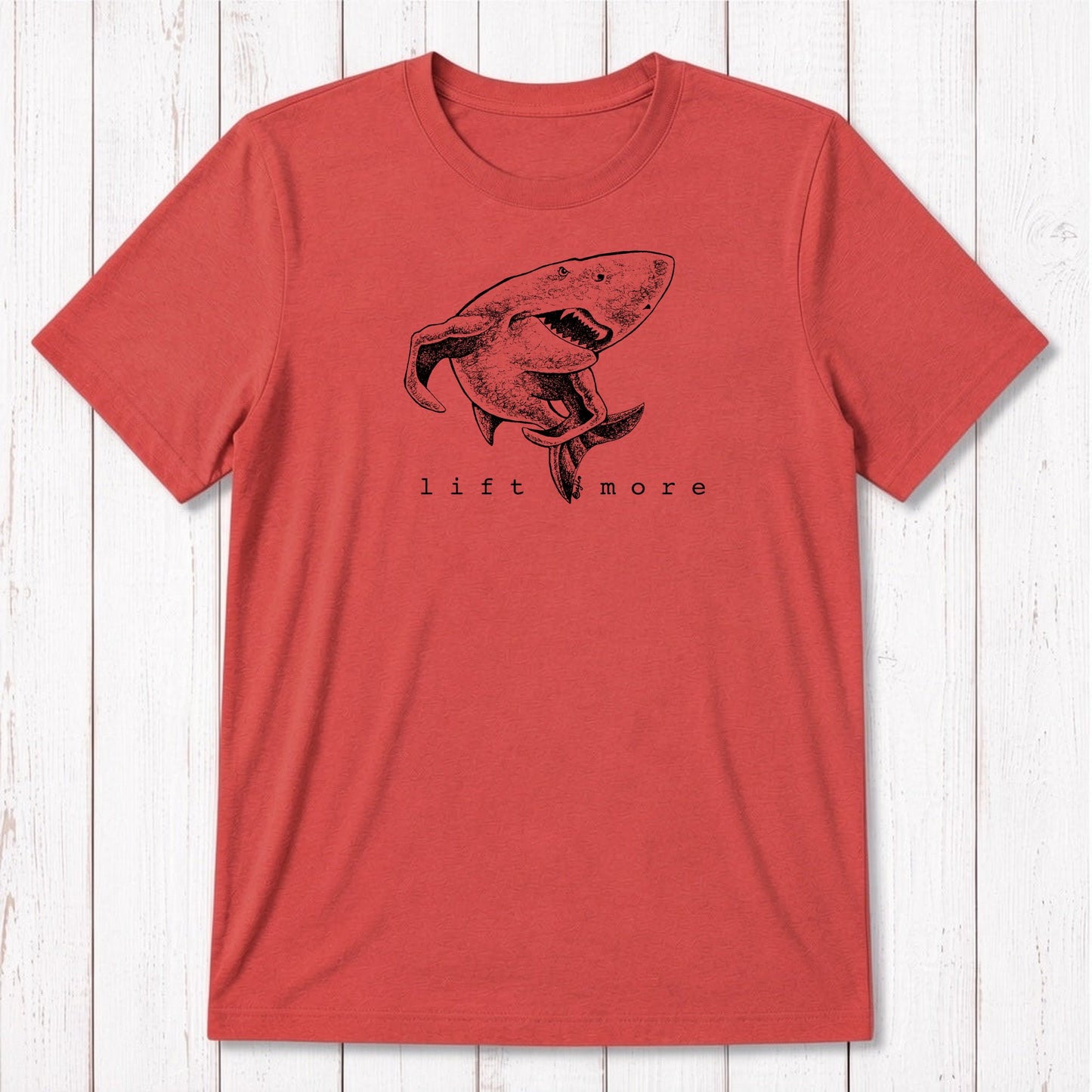 Red men's workout tee with white shark and 'Lift More' print, crafted from soft bamboo and organic cotton fabric.