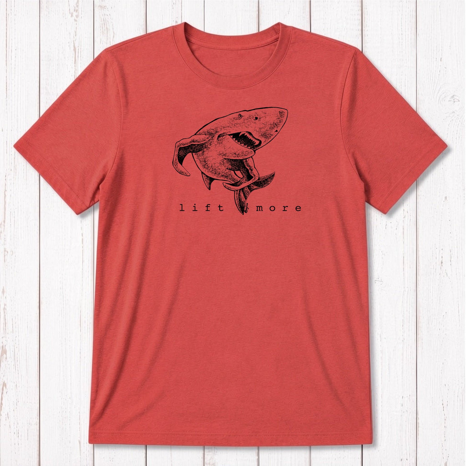 Red men's workout tee with white shark and 'Lift More' print, crafted from soft bamboo and organic cotton fabric.