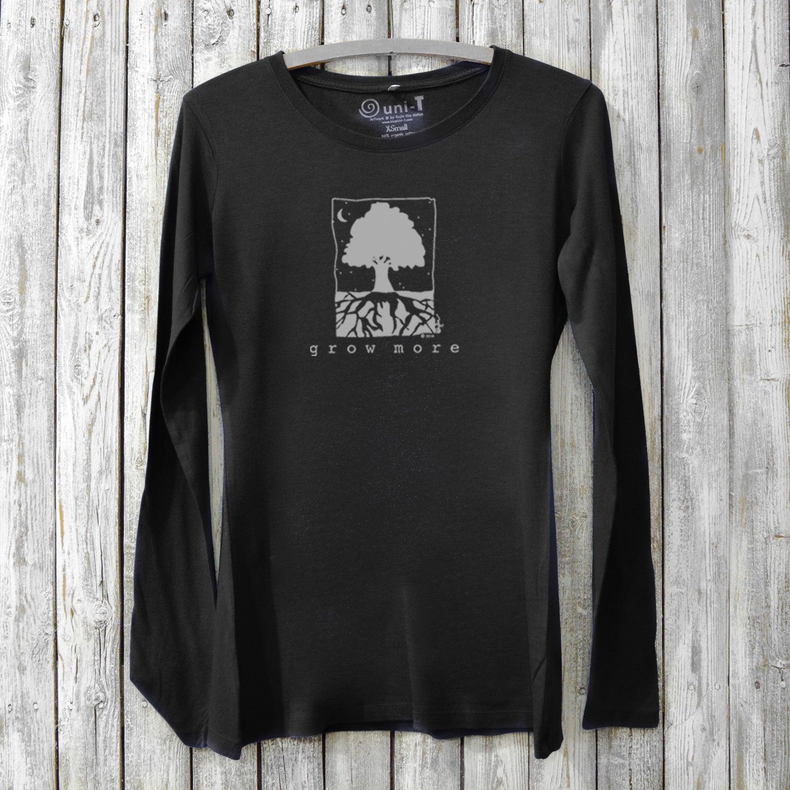 Black sustainable women's long sleeve T-shirt with nature-inspired 'Grow More' tree print, ideal gift for plant lovers and gardening enthusiasts.