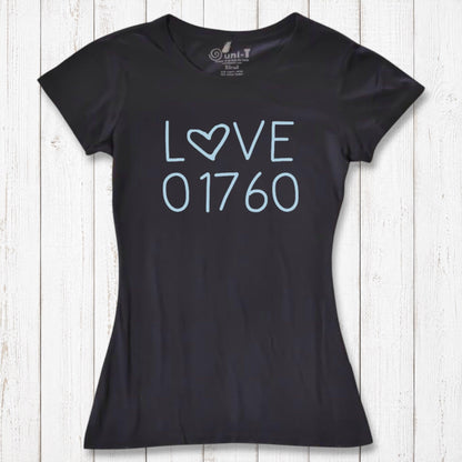 Black women's T-shirt made of organic cotton and bamboo with a light blue 'LOVE' graphic and the number 01760, laid on white wooden background