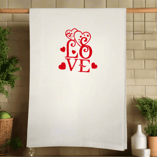 Love Embroidered Towel - Embroidered Kitchen Towel hanging in a cozy kitchen, featuring red love and heart motif for Valentine's or everyday charm.