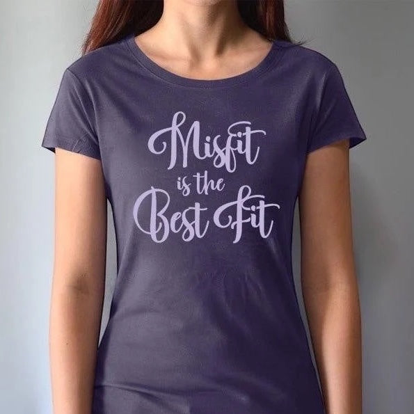Model wearing Women's Misfit T-Shirt in dark purple bamboo and organic cotton. Features bold lavender script for self-expression and comfort.
