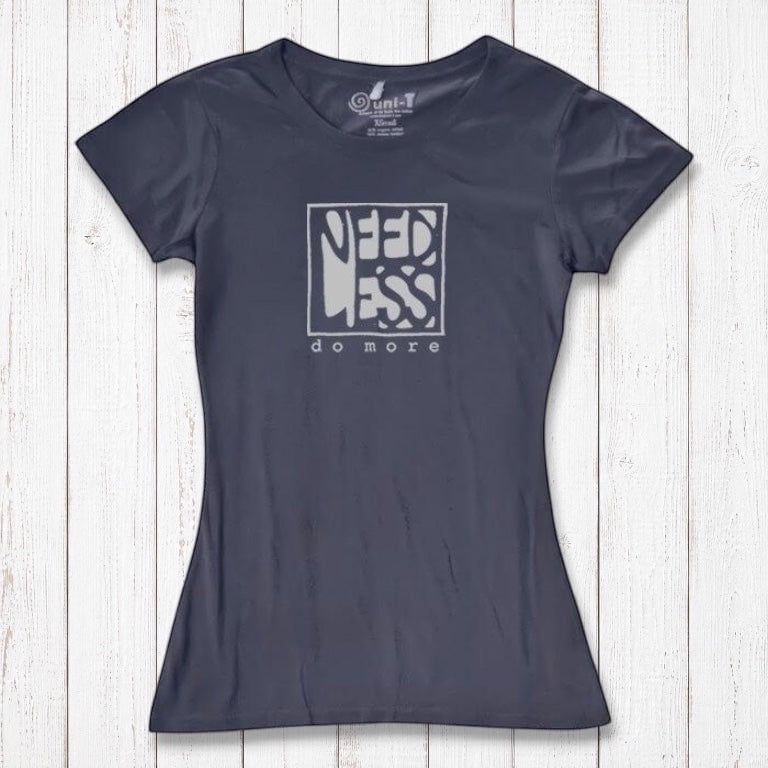 Navy blue women's inspirational t-shirt in bamboo and organic cotton. Features 'Need Less Do More' quote for minimalist lifestyle lovers.