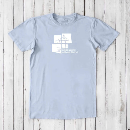 Light blue men's Natick Pride T-shirt in bamboo and organic cotton, white cultural district logo, eco-friendly Massachusetts townie gift.