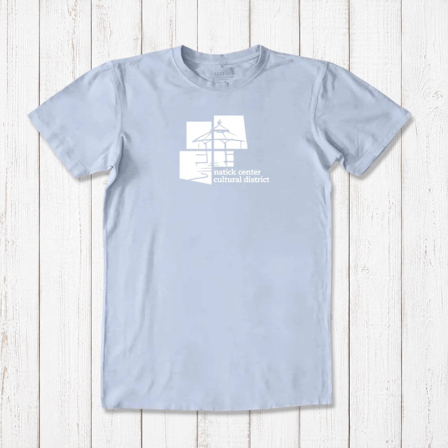 Light blue men's Natick Pride T-shirt in bamboo and organic cotton, white cultural district logo, eco-friendly Massachusetts townie gift.