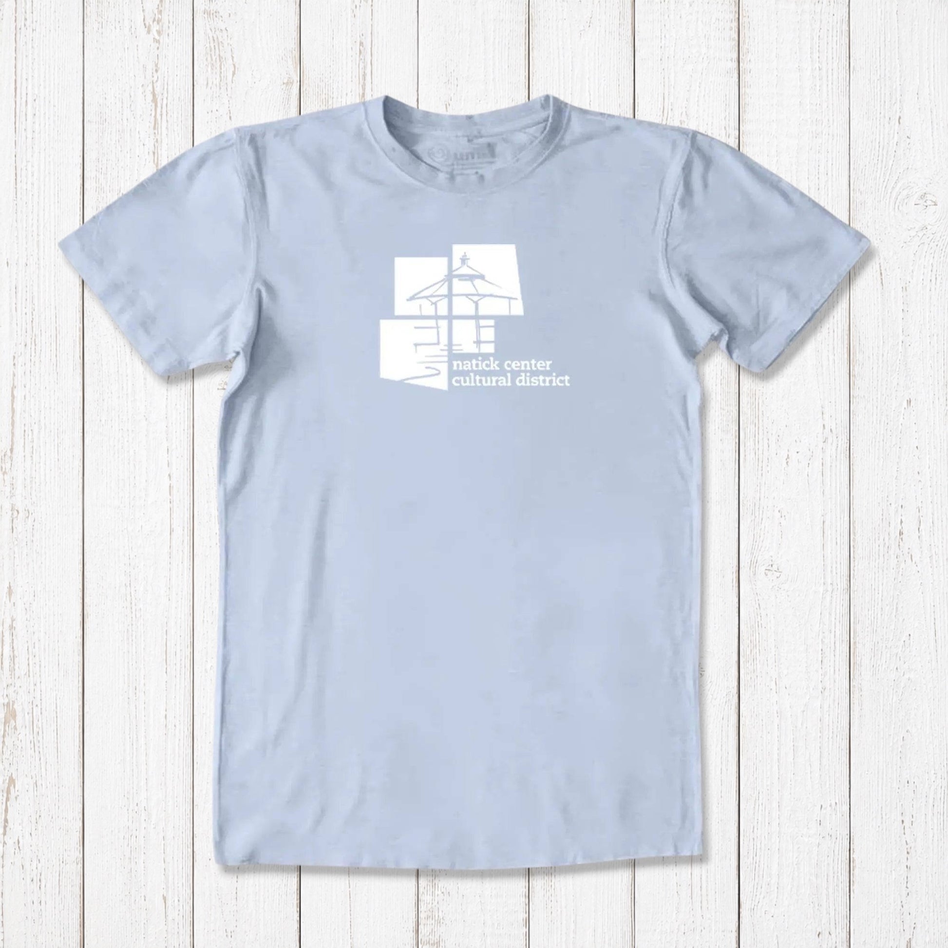 Light blue men's Natick Pride T-shirt in bamboo and organic cotton, white cultural district logo, eco-friendly Massachusetts townie gift.