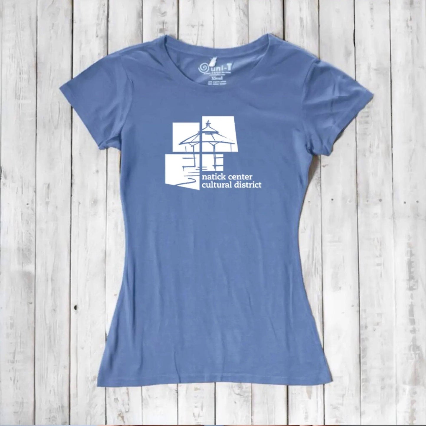 Light blue Women's Bamboo Natick Center T-Shirt with white Natick Cultural District design. Eco-friendly bamboo and organic cotton tee.