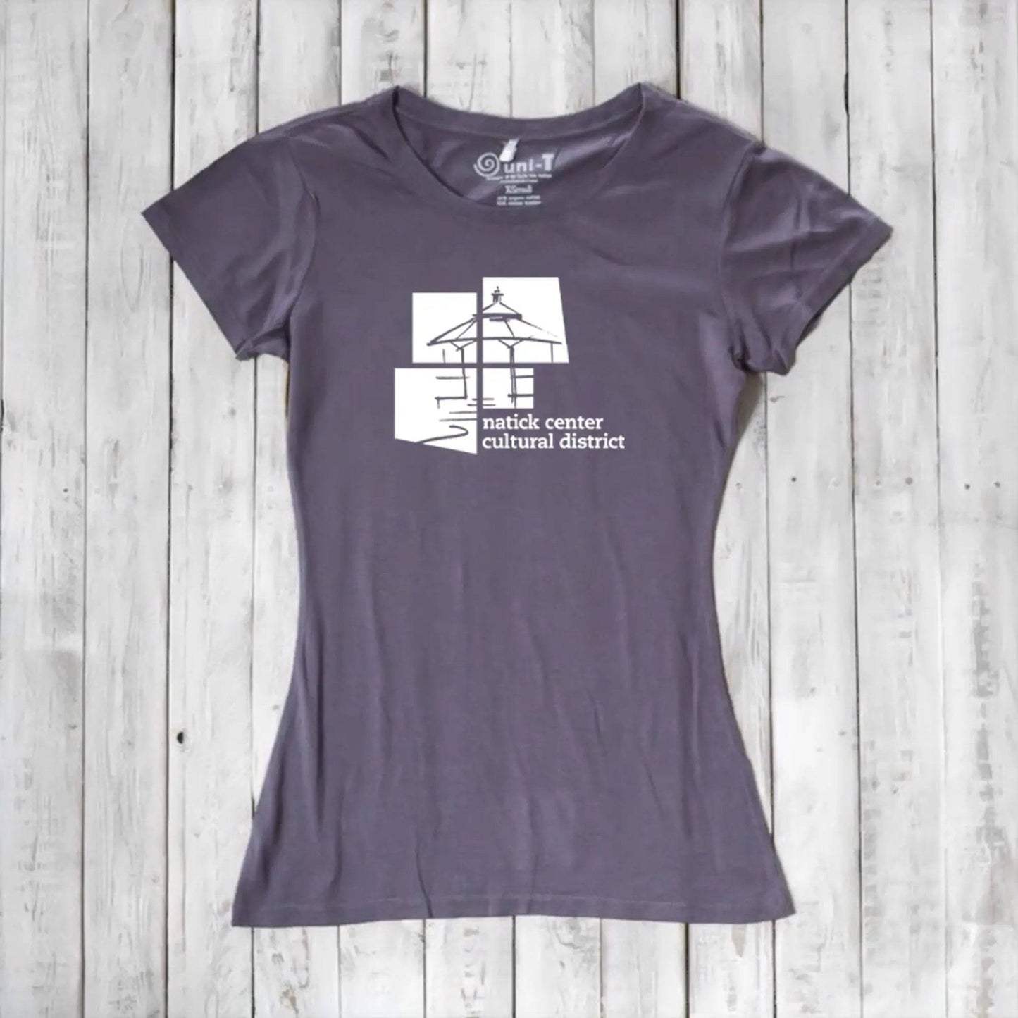 Slate purple Women's Bamboo Natick Center T-Shirt with white cultural district logo. Eco-conscious bamboo and organic cotton blend.