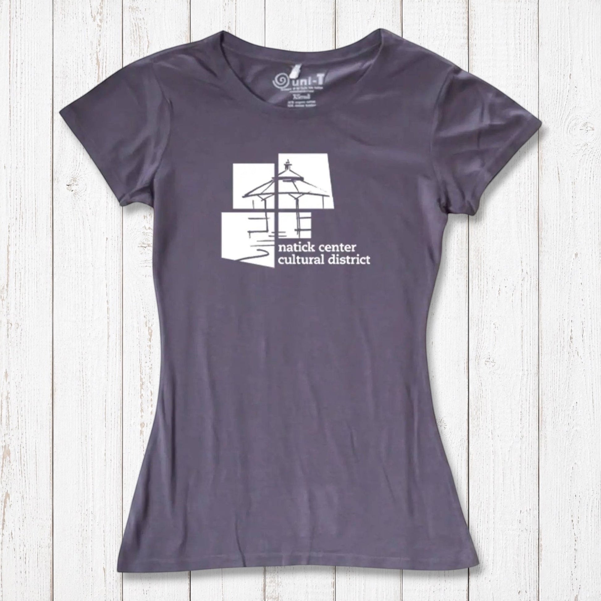 Slate purple Women's Bamboo Natick Center T-Shirt with white cultural district logo. Eco-conscious bamboo and organic cotton blend.