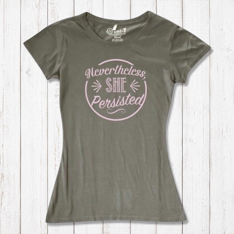 Olive green women's 'Nevertheless She Persisted' tee with pink text. Eco-friendly bamboo and organic cotton top for feminist empowerment.