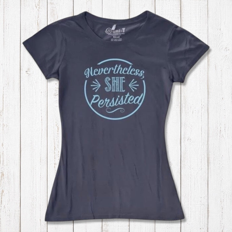 Charcoal gray 'Nevertheless She Persisted' women's tee with blue text. Feminist empowerment shirt made from sustainable bamboo and cotton.