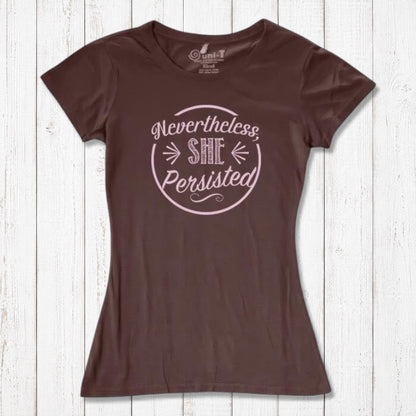 Chocolate brown 'Nevertheless She Persisted' women's t-shirt with pink text. Feminist empowerment top in sustainable bamboo and cotton blend.