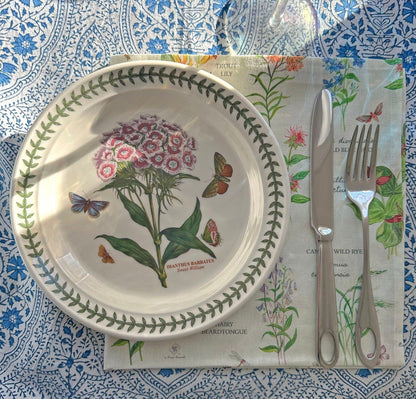 Nature-inspired fabric napkin with flowers and butterflies