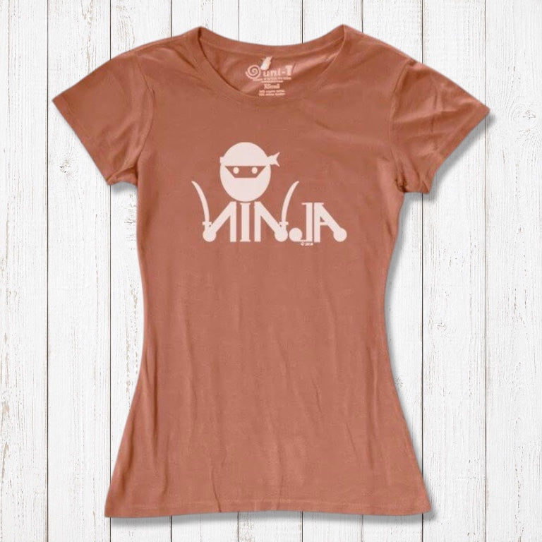 Rust orange Women's Ninja T-Shirt with white ninja graphic, crafted from bamboo & organic cotton for eco-friendly martial arts fashion.