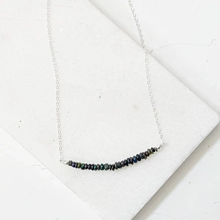 Opal Bar Necklace with genuine opal rondelle beads on a 17.5” sterling silver chain, displayed on a white background.
