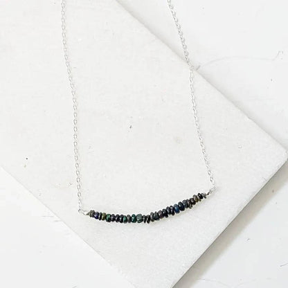 Opal Bar Necklace with genuine opal rondelle beads on a 17.5” sterling silver chain, displayed on a white background.
