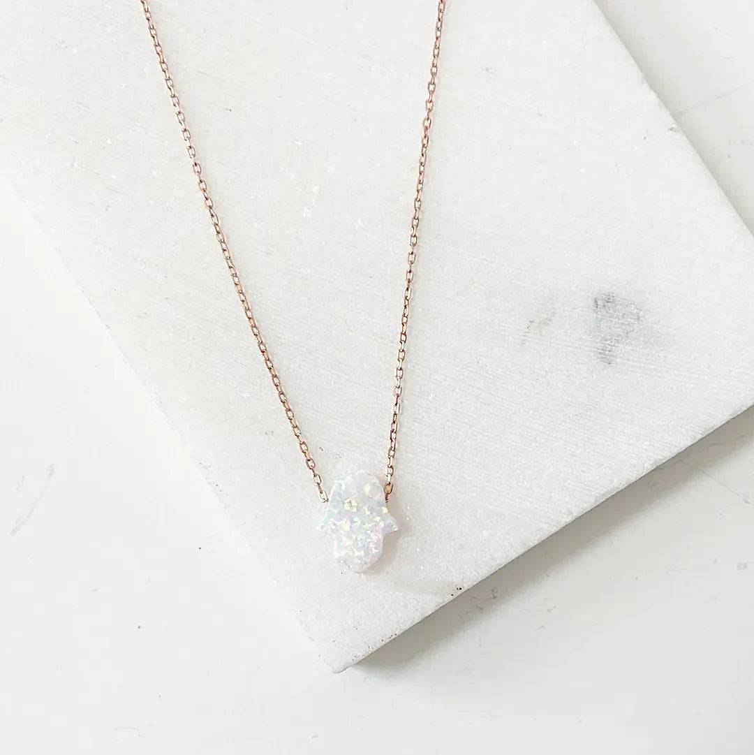 October Birthstone Opal Necklace with iridescent Hamsa charm on rose gold chain, ideal for layering or gifting for October birthdays.