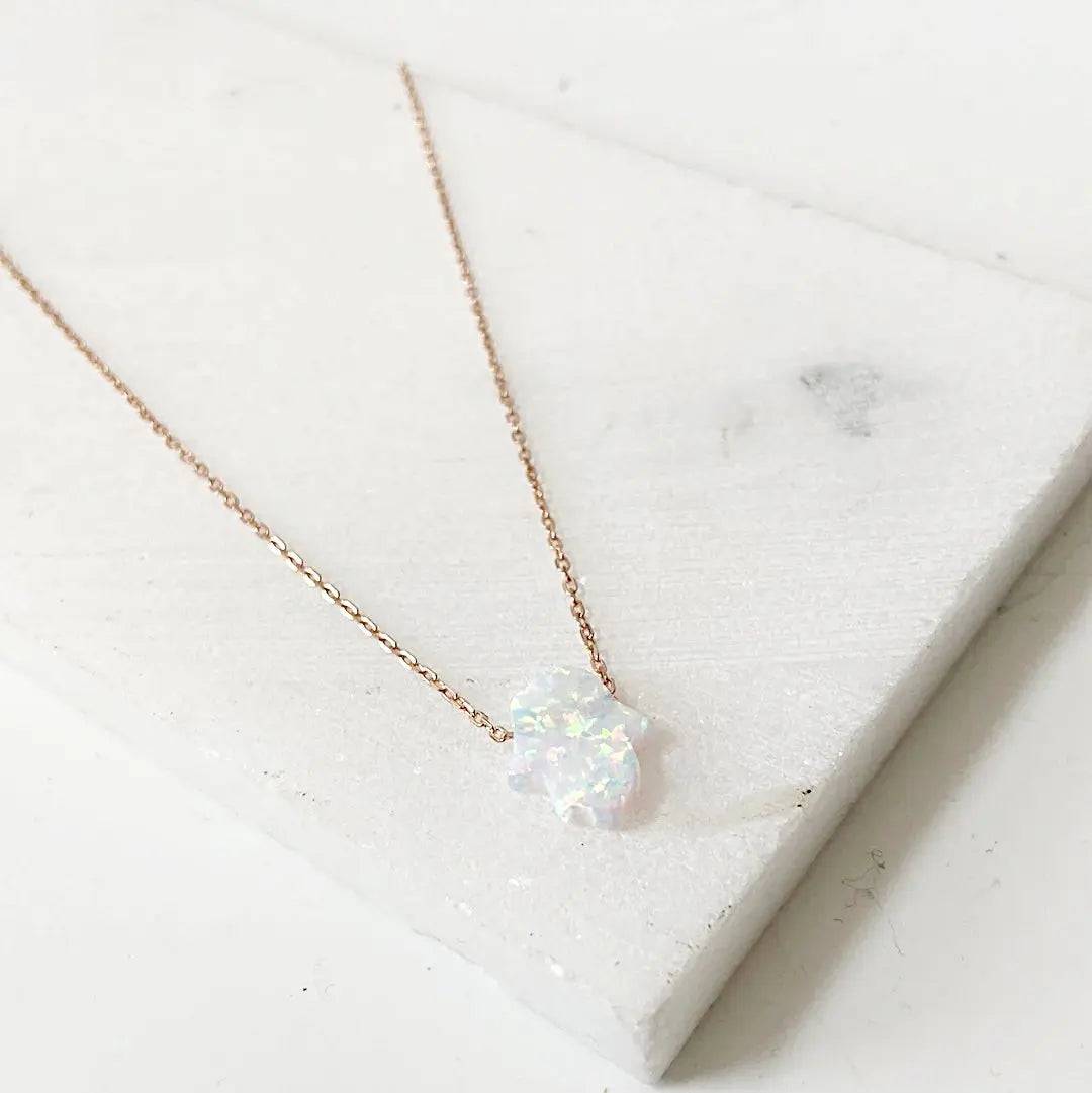 Elegant Opal Birthstone Necklace with lab-created Hamsa charm on rose gold chain, a stylish gift for October-born friends or loved ones.