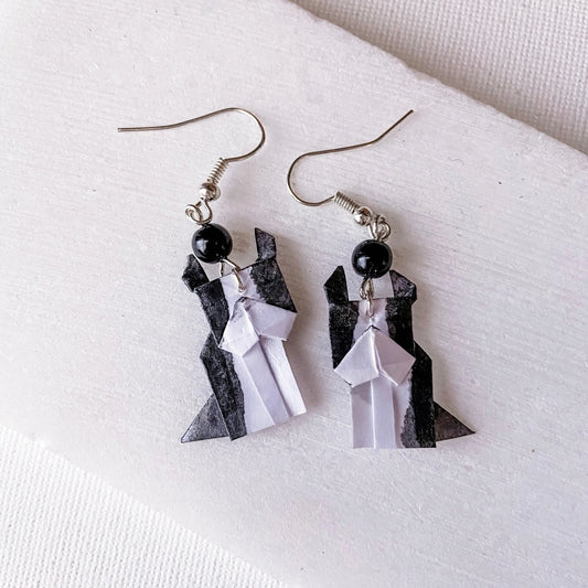 Origami Dog Earrings - Boston Terrier design featuring black and white paper with acrylic sealant and black bead accents, 1.25-inch length.