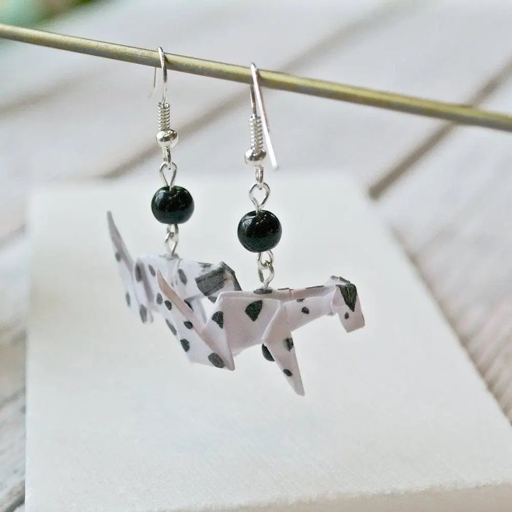 Side view of Dalmatian Origami Dog Earrings with black beads, highlighting the detailed origami craftsmanship and monochrome color scheme.