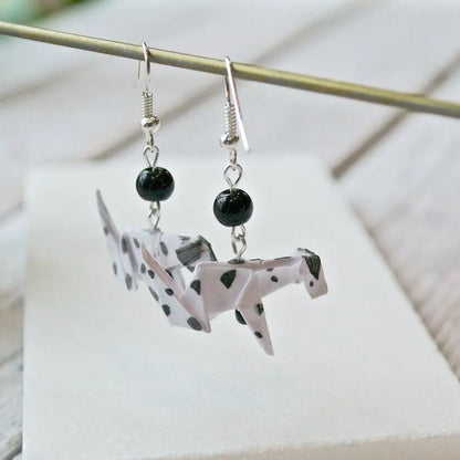 Side view of Dalmatian Origami Dog Earrings with black beads, highlighting the detailed origami craftsmanship and monochrome color scheme.