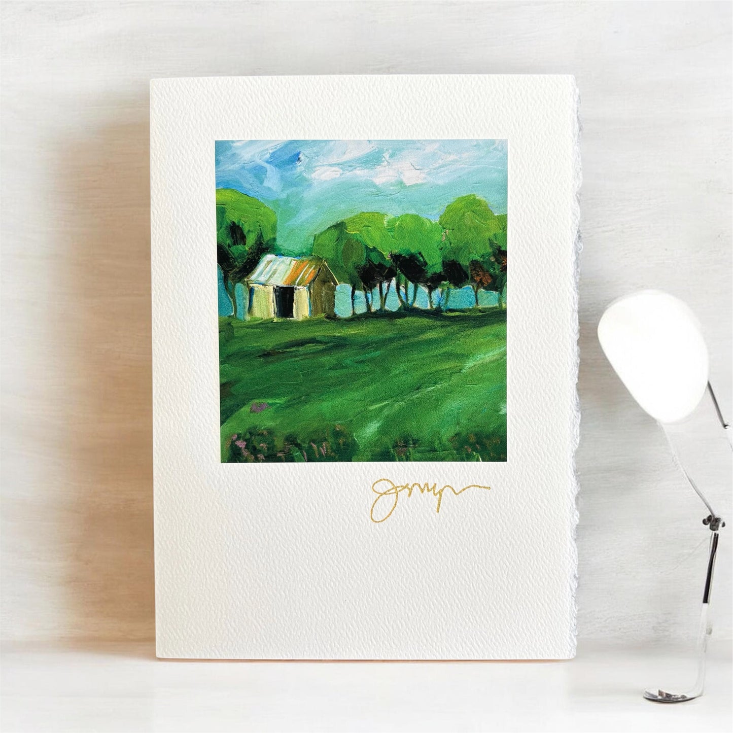 Artistic landscape greeting card with trees and a house, signed by Jody