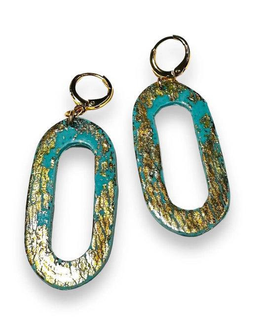 Oval turquoise polymer clay earrings with gold leaf detailing and gold plated hoops, part of the affordable gifts jewelry collection.
