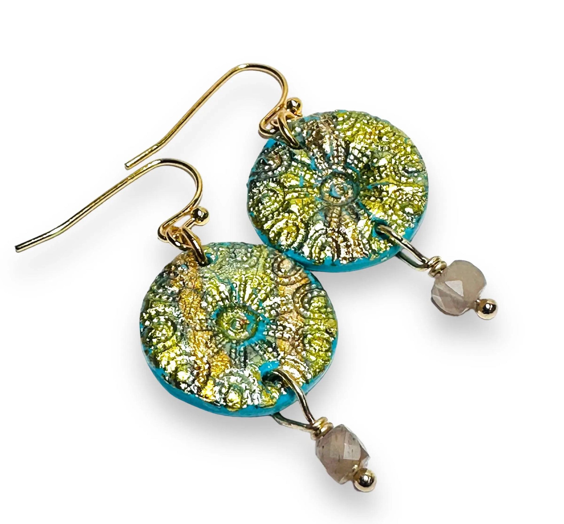 Floral embossed round polymer clay earrings with gold leaf and crystal bead dangles, perfect for unique and affordable gifting.
