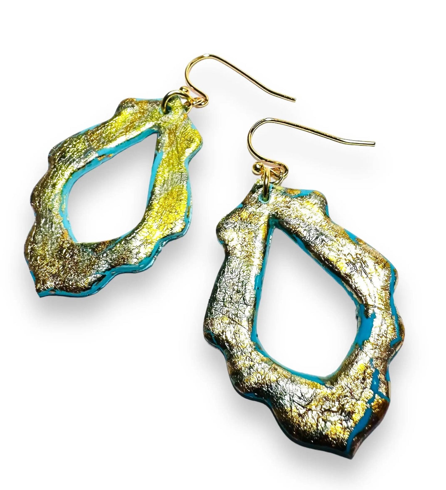 Teardrop-shaped polymer clay earrings with scalloped edges and gold foil accents, a stylish and affordable jewelry piece.