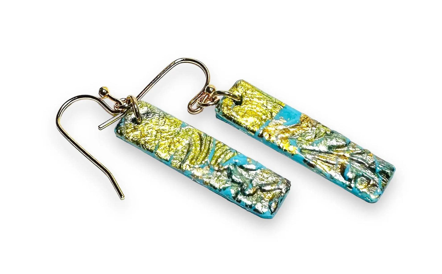 Rectangular turquoise polymer clay earrings with gold leaf marbling, a sleek and affordable accessory for gifting.