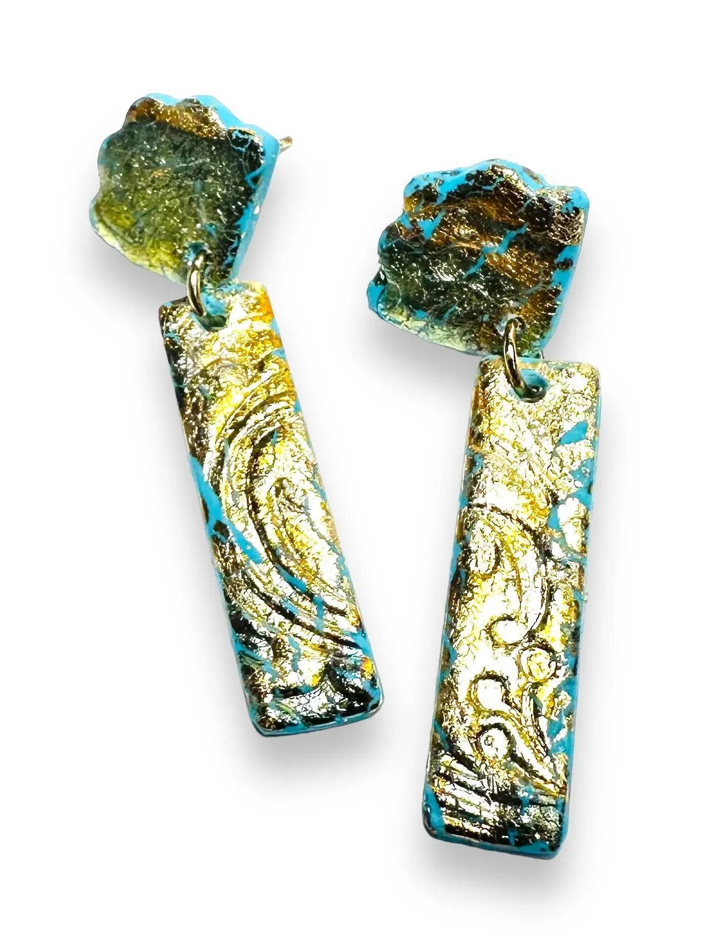 Rectangular embossed polymer clay earrings with gold foil and abstract top pieces, a unique and affordable jewelry gift.