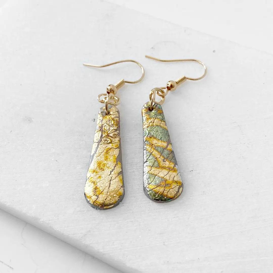 Handcrafted polymer clay earrings in gold and green tones with shimmer finish. Elegant and affordable gift option.