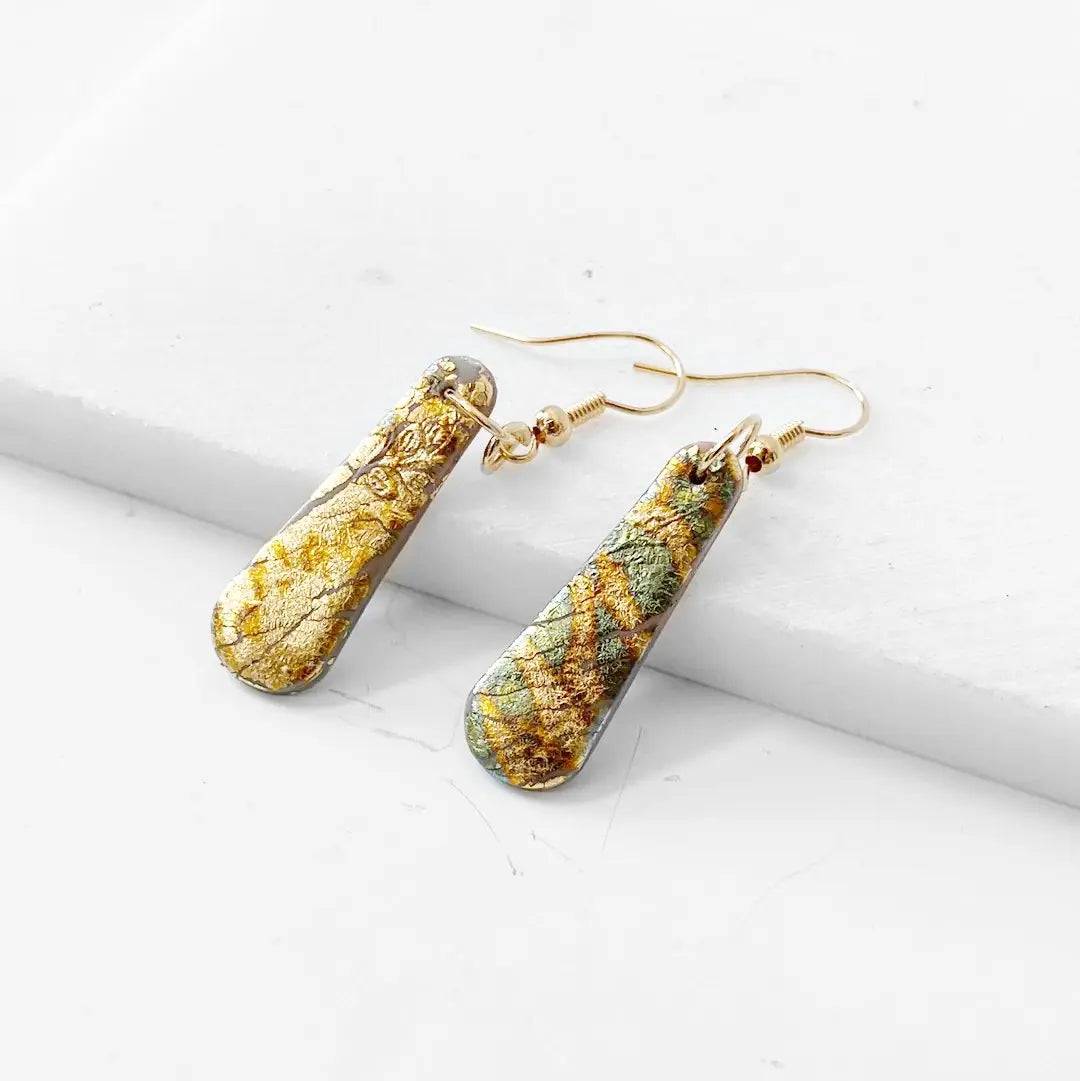 Gold Shine polymer clay earrings featuring textured shimmer design and gold plated hooks. Unique and affordable accessory.