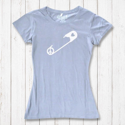 Light blue Women's Peace & Love T-Shirt with white safety pin graphic, laid flat. Eco-conscious tee promoting unity and acceptance.