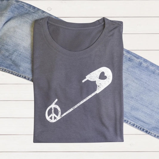 Gray women's graphic T-shirt made from bamboo and organic cotton featuring a white peace sign integrated with a safety pin and heart design, casual style